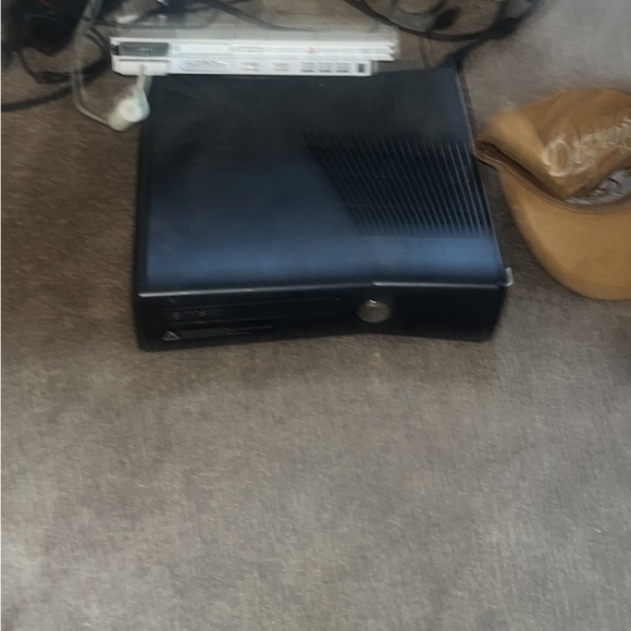 Xbox 360 with games and controllers